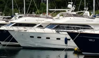 Boats docked at marina, representing marine hardware and fastener applications